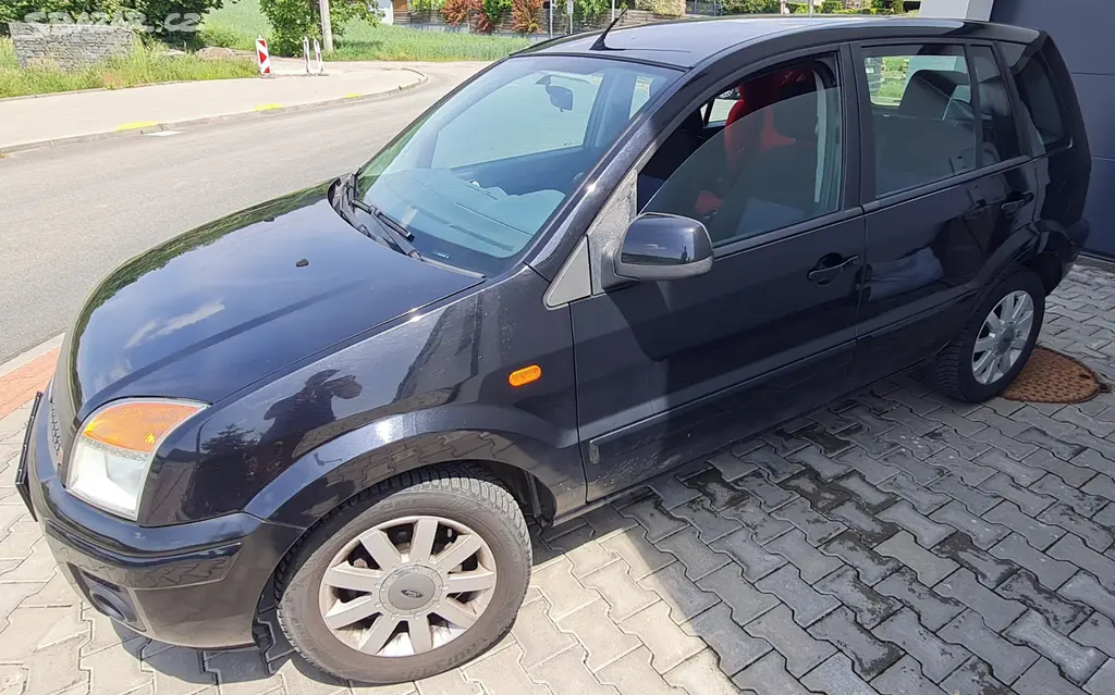Ford Fusion 1,4i, RV12/2012 s autosedačkou Britax